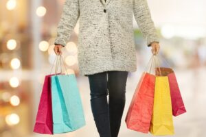 woman uses shopping apps that give credits